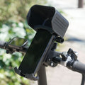 Sun visor handlebar phone holder for bicycles and motorcycles